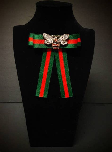 gucci bow tie brooch